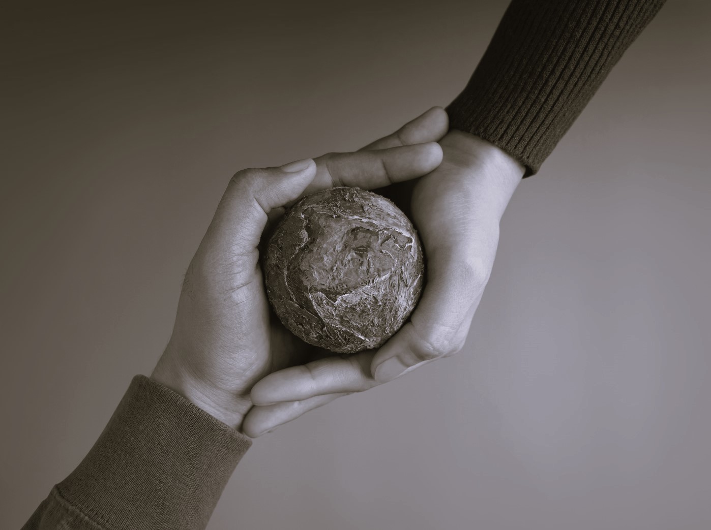 Hands holding the Earth